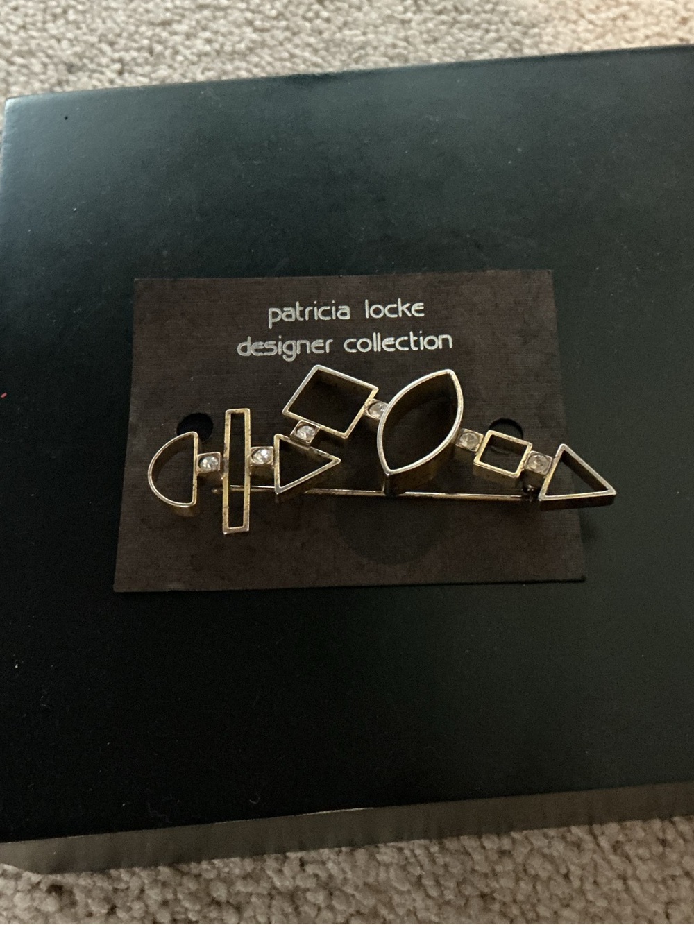 VINTAGE PATRICIA LOCKE GOLD TONE GEOMETRIC BROOCH WITH RHINESTONES